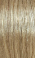 Close up image of LUSHIERE clip in hair extensions blonde colour #16 dirty blonde taken in natural light