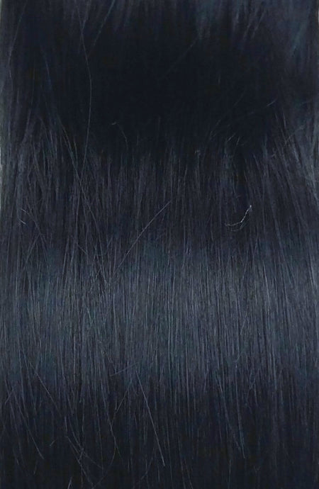 Close up image of LUSHIERE clip in hair extensions in black colour #1 taken in natural light