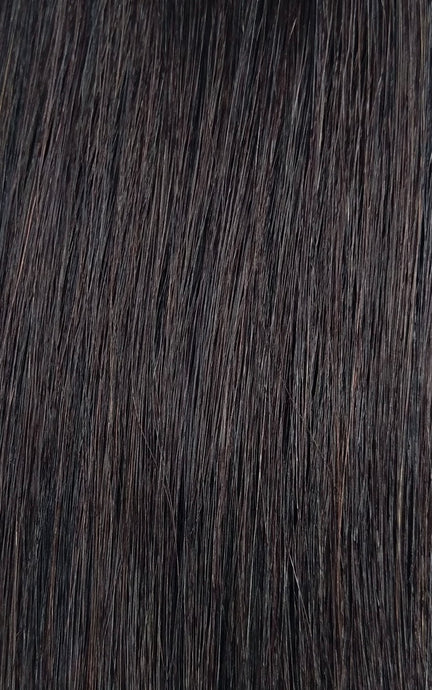 Close up image of LUSHIERE clip in hair extensions in very dark brown colour #2d Deep Dark Brown taken in natural light