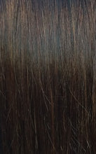 Close up image of LUSHIERE clip in hair extensions in brunette colour #2 chocolate brown taken in natural light