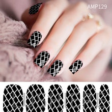 Image of manicured hand wearing nail wraps nail stickers in Brick Monochrome design