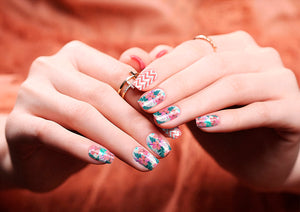 Image of manicured hands wearing nail wraps nail stickers in Tropical White design