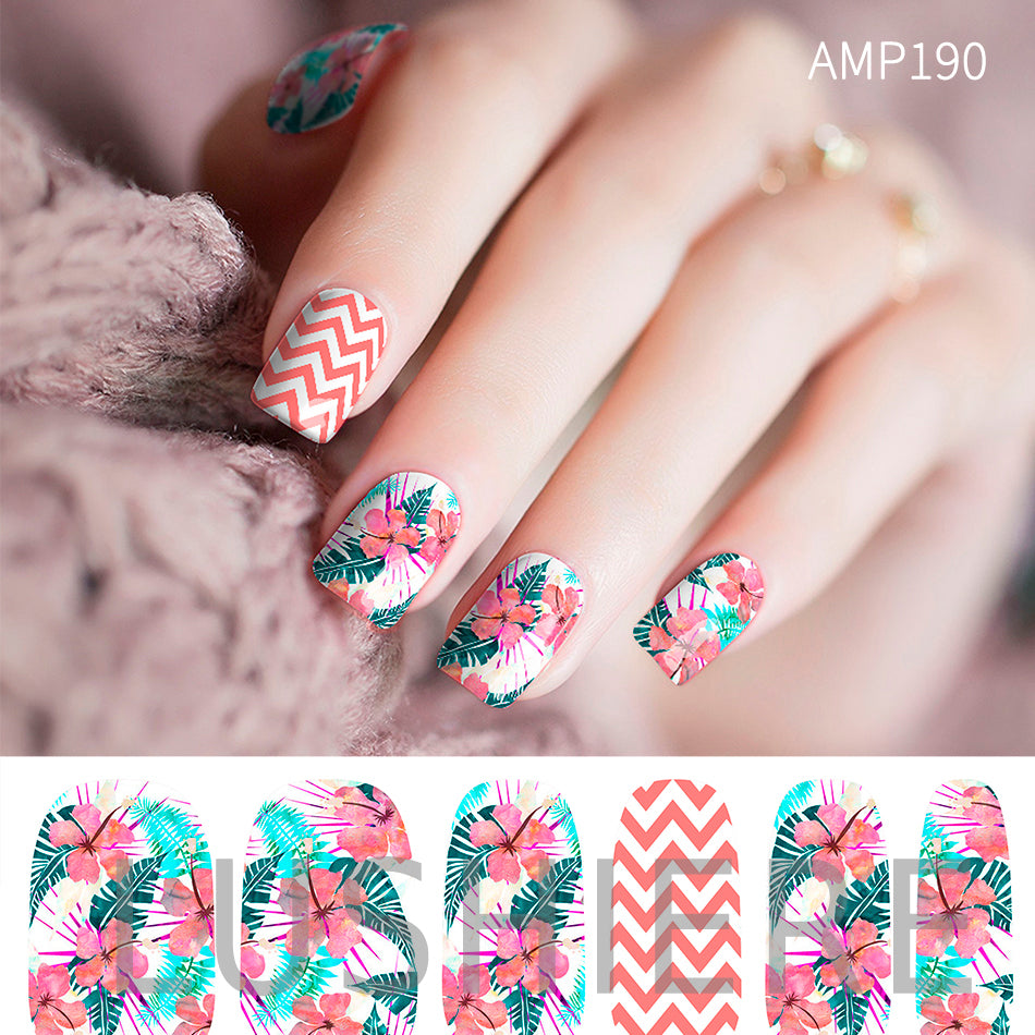 Image of manicured hand wearing nail wraps nail stickers in Tropical White design