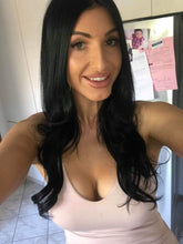 Image of beautiful woman with luscious shiny black hair wearing LUSHIERE clip in hair extensions